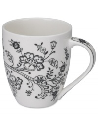 Oleg Cassini weaves a table of playful sophistication with the Ava mug, featuring lacy flowers and dots in timeless black and white.