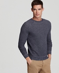 Warm up to cooler weather in this superior crewneck sweater from Theory, perfect with jeans or casual pants on a breezy afternoon.