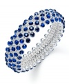 Slip on some soothing tones that add allure to any look. Charter Club's chic bubble beaded style features blue glass accents in silver tone mixed metal. Bracelet stretches to fit wrist. Approximate diameter: 2-1/4 inches.