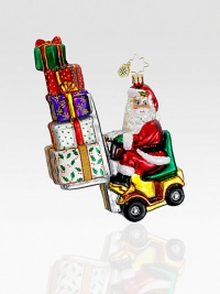 The elves need some help this year and Santa knows exactly what will do the job: A festive forklift! Hand-blownHand-painted6½ tallMade in Poland