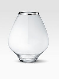 A masterful balance between strength and poetry, handcrafted in glass with a bulb-like shape that does justice to your most artful flower arrangements. From the Grace CollectionGlass with stainless steel rim8¼H X 7 diam.Hand washImported