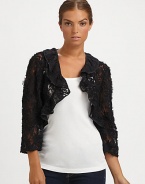 EXCLUSIVELY AT SAKS. A classic bolero silhouette, dressed up with ribbon trim in a stunning lace design.Lace collarThree-quarter sleevesOpen frontPolyesterAbout 18 center backDry cleanMade in the USA of imported fabric