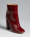 Polished perfection, these Chloé booties put a high-gloss finish on anything you pair them with.