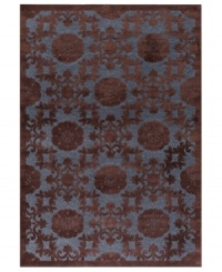 Lose yourself in the spellbinding look and unbelievably plush feel of Couristan's Pave Bezel Medallion rug. Woven of a luxe blend of viscose, silk and chenille for one-of-a-kind texture and high-low carved effect, the medallion-patterned rug is rendered in rich chestnut and lapis hues to add high style to any room.