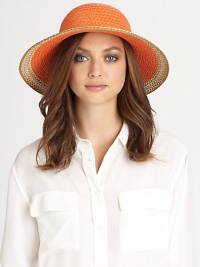 This dramatic, packable straw topper features signature logo rivets, elasticized inner band and an oversized, sloped brim for maximum sun protection and style.Brim, about 4.25Elasticized inner band fits most95% UVA/UVB protectionPolypropylene/polyesterSpot cleanImported and hand-finished in the USA