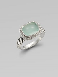 From the Noblesse Collection. A beautiful cabochon of aqua chalcedony surrounded in dazzling diamonds on a sterling silver shank. Aqua chalcedonyDiamonds, .21 tcwSterling silver Width, about .31Imported 