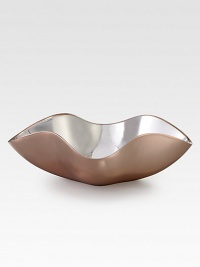 An elegant, undulating form handcrafted of metal alloy with a glowing copper plated exterior.Metal alloy and copperplateHandmadeSigned by designer Wei Young16L X 11W X 3.5HHand washImported