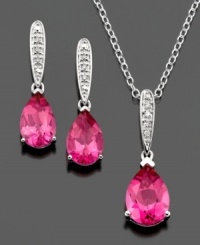 Make a charming entrance with this beautiful necklace and earrings set. Pear-cut pink topaz (6-1/3 ct. t.w.) are highlighted by round-cut diamond accents set in sterling silver. Pendant measures approximately 18 inches with a 1-inch drop. Earring drop measures approximately 3/4 inch.