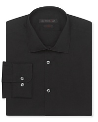 Demonstrate your taste for modern fashion with this handsome dress shirt from John Varvatos USA, fetching with a tie at the office, sleek at night when the clubs open up.