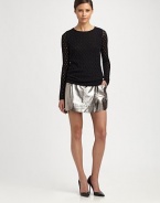 Glisten away in this daring, metallic leather mini skirt. Slash pocketsAbout 13 longLeatherDry clean with leather specialistImportedModel shown is 5'9 (175cm) wearing US size 4.