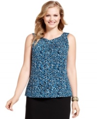 The bold print and bright color of Calvin Klein's plus size top will put a stylish spin on your ensemble. Try tucked into a pencil skirt or layered with pants and a navy blazer.