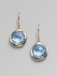 From the Lollipop Collection. Exquisitely faceted blue topaz drops, framed in gleaming 18k yellow gold. Blue topaz 18k yellow gold Drop, about 1 Diameter, about ½ Ear wire Imported