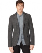 This Calvin Klein Jeans blazer offers a classic look that can be dressed up or down for versatile style.