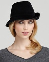 This Helen Kaminski fedora sums up posh refinement in dark, plush fur. Turn up the left brim for extra panache.