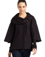 THE LOOKDramatic portrait collar with button closureThree-quarter length cape sleevesButton closures at sidesTHE FITAbout 27 from shoulder to hemTHE MATERIALFleece wool/nylonFully linedCARE & ORIGINDry cleanMade in ItalyModel shown is 5'9 (175cm) wearing US size 4. 