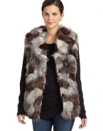 THE LOOKVariegated faux fur design Shawl collarFront fur hook closuresSleevelessSeam pocketsTHE FITAbout 26 from shoulder to hemTHE MATERIALPolyester/acrylicCARE & ORIGINDry cleanImportedModel shown is 5'10 (177cm) wearing US size Small. 