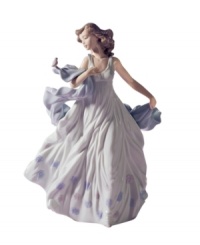 A fairytale moment in glazed porcelain, Lladro's Summer Serenade figurine depicts a gorgeous young woman captivated by the call of a feathered friend.