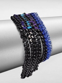 Inspired by cultures and travels around the world, this thread accented link chain design is elegant, yet colorful. Matte black-plated brassPolyester threadLength, about 6Lobster clasp closureMade in USA