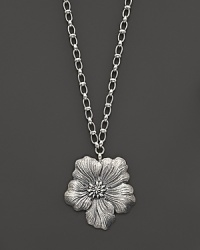 Delicate gardenias, captured at the height of their beauty in sterling silver, bloom on this necklace from Buccellati.