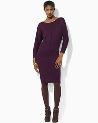 Casual elegance is updated for the modern woman in a chic sweater dress, crafted with a bateau neckline and dolman sleeves.