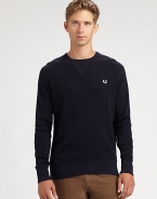 Classic fitting crewneck lends a carefree, casual tone to your weekend basics, rendered in lightweight cotton for extended wear and comfort.CrewneckRibbed knit cuffs and hemCottonDry cleanImported