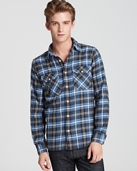 Soft cotton flannel take on a plaid pattern for classic cold-weather comfort. From Jack Spade.