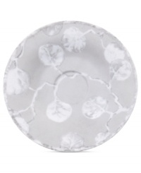 Michael Aram branches out from his renowned metal collection with the Botanical Leaf saucer. Simple foliage rooted in fine Limoges porcelain brings a lightness and ease to modern tables in shades of gray.