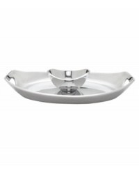 At once graceful and modern, this aluminum chip and dip reflects great taste at every meal. A radiant oval tray with sloping sides and handle cutouts holds an equally chic bowl for serving guacamole, salsa, or spinach dip. From Dansk's collection of serveware and serving dishes.