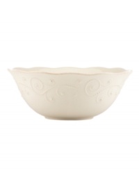 With fanciful beading and a feminine edge, this serving bowl from the Lenox French Perle white dinnerware collection has an irresistibly old-fashioned sensibility. Hard-wearing stoneware is dishwasher safe and, in a soft white hue with antiqued trim, a graceful addition to every meal.