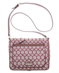 Add some signature style to your tech accessorizing with this jacquard logo silhouette from Nine West. Button snap and top zip closures securely stow iPad when you're on-the-move, while the convenient crossbody strap keeps hands free.