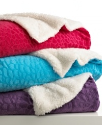 Comfort zone. Lounge around with the soft texture and chic style of these throws from Teen Vogue, featuring an embossed crocodile pattern and a variety of bright colors. Reverses to sherpa. Coordinate with the matching pillows.