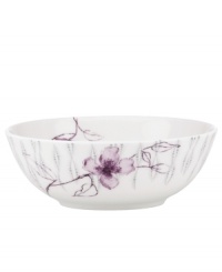 Blur the line between garden style and modern design with the Watercolors Amethyst bowl. Purple blossoms flourish against a playful dot pattern while the white coupe shape couples the sleek look and unparalleled durability of bone china. (Clearance)