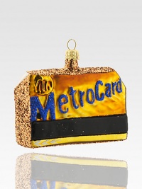 Visitors and natives alike will recognize the ubiquitous Metrocard, absolutely essential for navigating the city, here whimsically recreated in glittering glass.Handmade and hand-paintedGlassAbout 3.75L X 3.25H X 1.5DImported