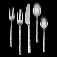 Hammered Flatware is made of stainless steel and features a hammered, three-dimensional design on a modern chopstick-inspired shape. Vera Wang Stainless Steel Flatware Collection communicates its quality and sophistication with a significant weight and dimension. Detailed and balanced this flatware is perfect for both a traditional or modern setting. High quality 18/10 stainless steel flatware.