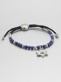 From the Batu Bedeg Collection. A beaded strand of carved silver and richly colored lapis is strung on a black fabric cord and highlighted by a stunning Star of David silver charm.LapisSterling silverAdjusts from about 6 to 9 longSliding bead closureMade in Bali