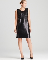 Dripping with decadent sequins, this Calvin Klein Plus dress lends liquid-like dimension to your cocktail look. Amp up the shine factor with sleek silver accents.