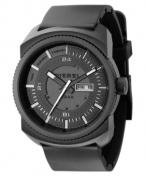 Get a modern sporty look with this dark watch by Diesel. Black polyurethane strap and round stainless steel case, 47mm. Black dial with white stick indices, date window and logo. Analog movement. Water resistant to 50 meters. Two-year limited warranty.