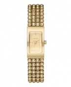 Tell time with rows of shine, thanks to this brilliant DKNY watch. Bracelet crafted from four rows of crystal set in goldtone stainless steel and rectangular case. Champagne dial features goldtone hands, stick indices and logo. Quartz movement. Water resistant to 50 meters. Two-year limited warranty.