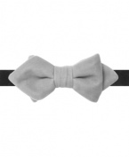 Keep it skinny for super-sized impact with this velveteen bow tie from Countess Mara.