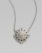 From the Windsor Collection. A lacy medallion combining graphic shapes, delicate granulation and the sparkle of white sapphires hangs from a graceful chain of textured links. White sapphires Sterling silver and 18k yellow gold Chain length, about 17 Pendant diameter, about 1 Lobster clasp Imported