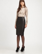 A timeless skirt silhouette made from Italian lambskin with a hint of stretch for a fantastic fit.Waist dartsBack zipperBack ventFully linedAbout 25 longLambskin leatherDry clean by leather specialistImported Model shown is 5'9½ (176cm) wearing US size 4. 