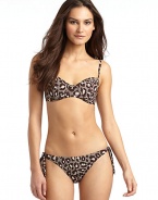 THE LOOKAllover leopard printPadded, underwire cupsAdjustable strapsBack claspTHE MATERIAL80% nylon/20% spandexFully linedCARE & ORIGINHand washMade in USAPlease note: Bikini bottom sold separately. 