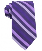 Go bold. This silk striped tie from Michael Kors makes an instant style statement in your wardrobe.