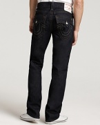 True Religion's straight leg, low rise jeans with signature horseshoes pocket styling in a bold, dark wash.