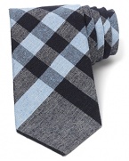 Burberry London preserves its heritage with a sophisticated signature check tie, crafted for a classic look that pairs well dressed up or down.