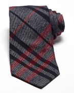 Burberry London preserves its heritage with a sophisticated signature check tie, crafted for a classic look that pairs well dressed up or down.