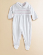 This angelic one-piece is crafted in plush pima cotton and embellished with eye-catching smocking and scalloping for sweet baby style.Peter Pan collarLong sleevesBack snapsBottom snapsPima cottonMachine washImported Please note: Number of snaps may vary depending on size ordered. 