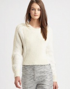 Pure knit wit-- this chunky, wool-blend sweater has an abbreviated silhouette and ribbed panels. RoundneckLong sleevesRolled cuffsBack besom pockets50% wool/25% acrylic/13% nylon/12% alpacaDry cleanImported of Italian fabricModel shown is 5'10 (177cm) wearing US size Small.