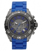 A larger than life sport watch in bold blues and edgy gunmetal, by Michael Kors.