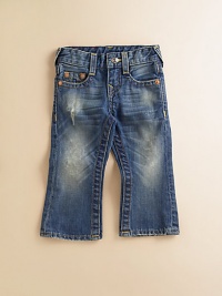 Darling denim for the little one, this distressed pair with a faded rinse is a fun take on the blues. Belt loops Front zipper with snap closure Five-pocket styling Back flap snap pockets Small Buddha pocket lining Cotton; machine wash Imported of American fabric Please note: distress pattern may vary